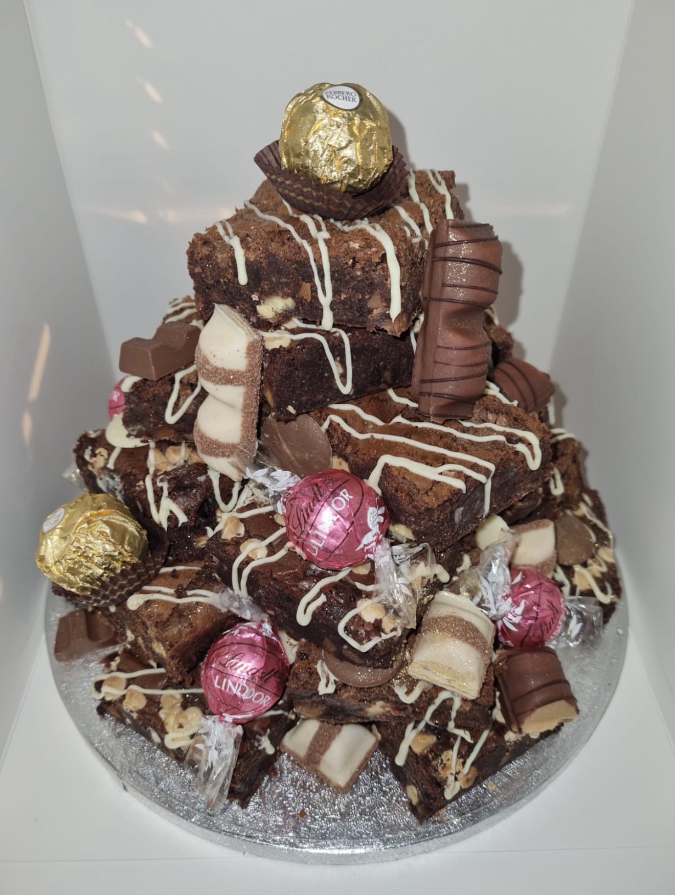 Brownie Tower stacked with assorted chocolates