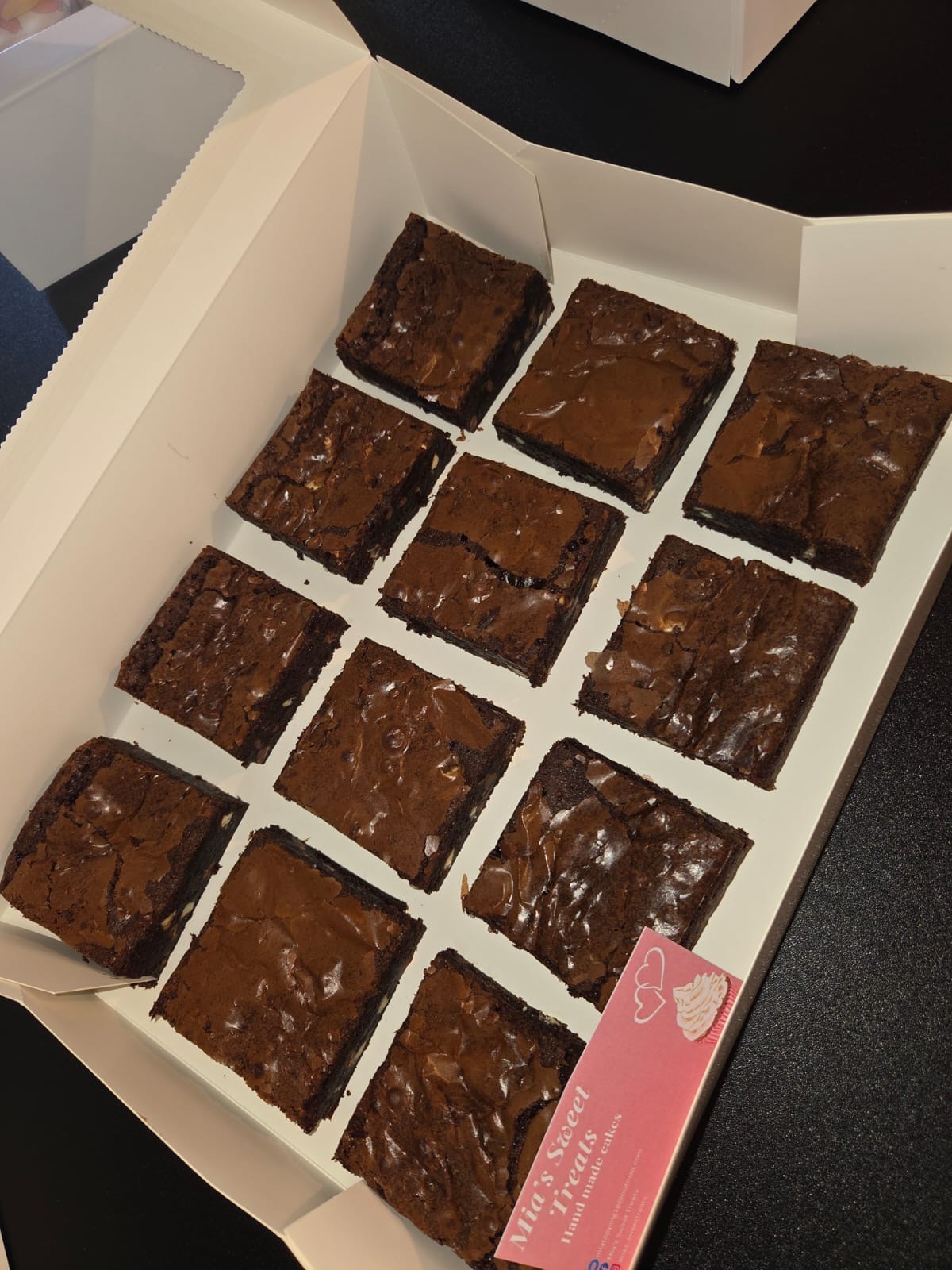 Double Chocolate Brownies arranged in a box